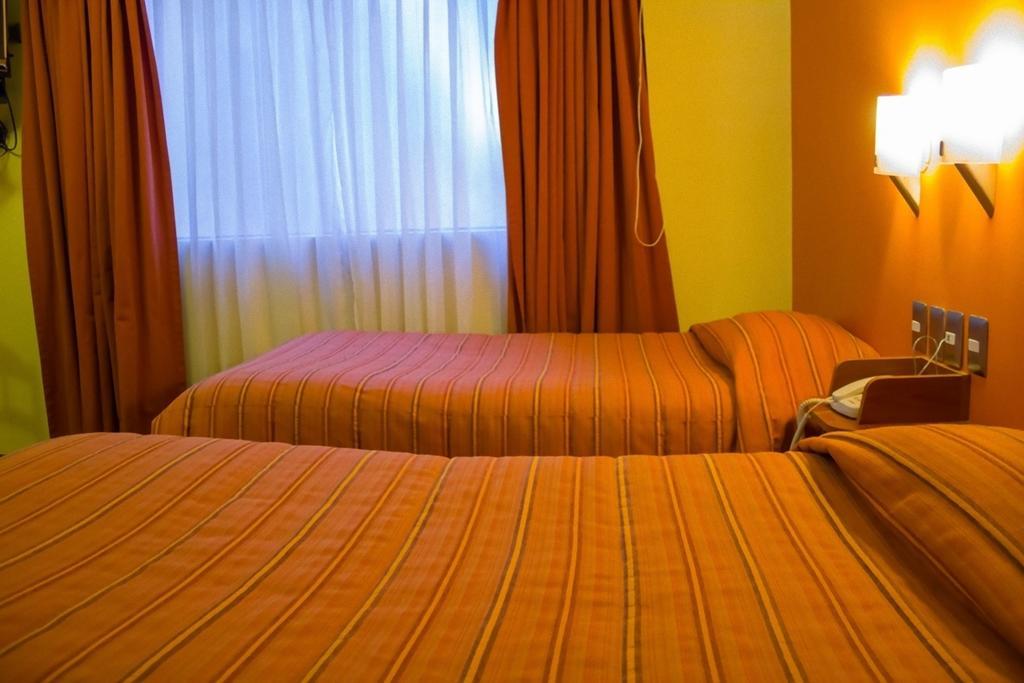 Mosoq Inn Puno Zimmer foto