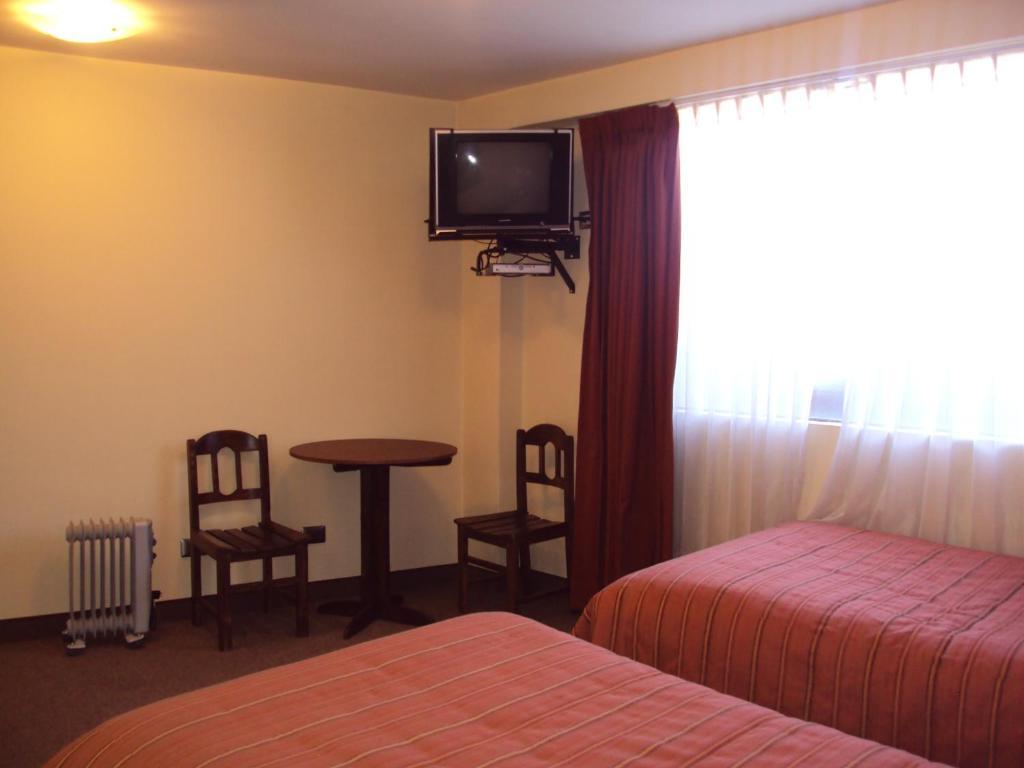 Mosoq Inn Puno Zimmer foto