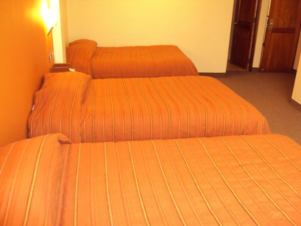 Mosoq Inn Puno Zimmer foto
